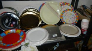 A mixed lot of disposable paper plates.