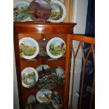 Fourteen Royal Worcester collector's plates.