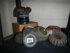 Two old gas masks.
