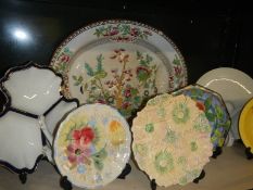 A mixed lot of interesting ceramic plates.