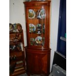 A good quality mahogany glazed corner cabinet.