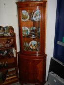 A good quality mahogany glazed corner cabinet.