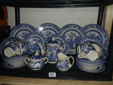 A mixed lot of blue and white plates etc.,