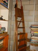 A set of wooden step ladders.