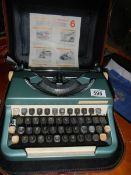 An Imperial Good Companion portable typewriter.