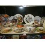 A mixed lot of bird decorated plates, a pheasant figure and an owl figure.