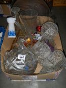 A large box of assorted glass ware.