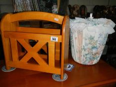 A pine magazine rack and a waste paper bin.