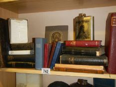 A mixed lot of books including Bibles.
