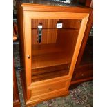 A good quality music cabinet with cut glass door.
