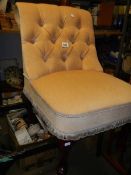 A good quality beige bedroom chair.