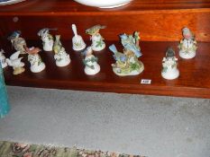 A mixed lot of bird ornaments, bells etc.,