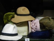 A mixed lot of vintage hats.