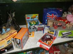 A mixed lot of toys including die cast models.