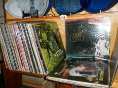 A mixed lot of LP records.