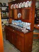 A good quality oak dresser with two glazed doors.