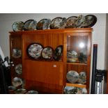 Approximately 30 Royal Doulton collector's plates.