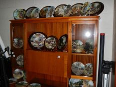 Approximately 30 Royal Doulton collector's plates.