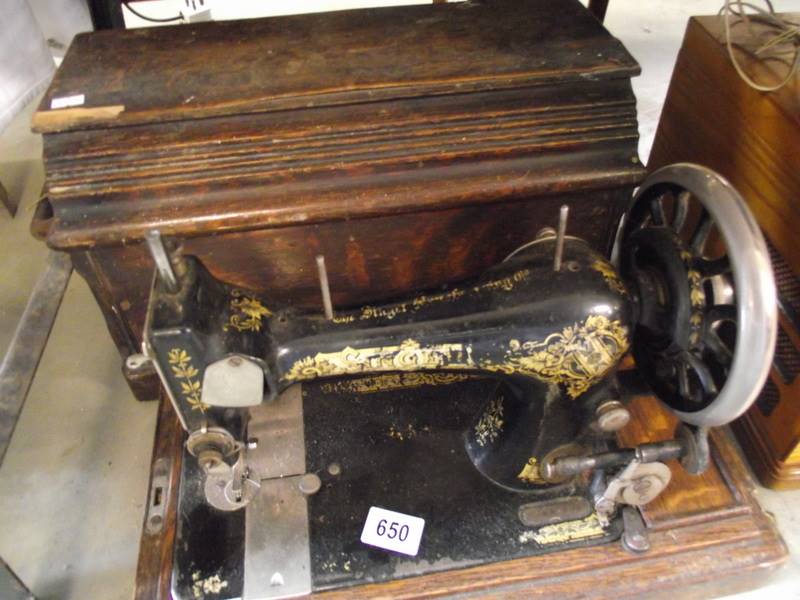 A vintage Singer sewing machine COLLECT ONLY