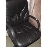 A black leather office chair
