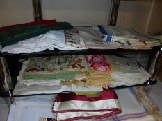 A good lot of linens and vintage tea towels.