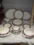 A dinner service by Keeling and Co Losal ware