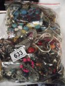 A bag of mixed costume jewellery