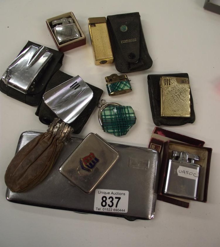 A mixed lot of vintage lighters including Ronson plus vintage money pouch etc