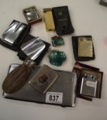 A mixed lot of vintage lighters including Ronson plus vintage money pouch etc