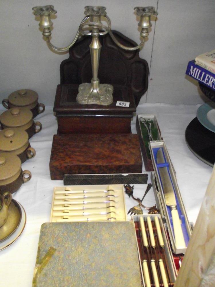 A selection of vintage cased cutlery etc including candleabra, mahogany tea caddy, burr walnut cigar