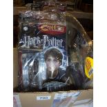 A quantity of Harry Potter chess pieces and magazines