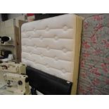 A 4'6" mattress with base and headboard