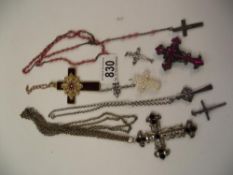 A quantity of crosses plus rosary beads etc