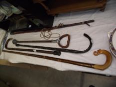 A selection of vintage walking sticks etc