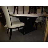 A modernist white marble effect dining table and 4 white leather chairs