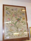 A mahogany framed tapestry of birds and flowers 53cm x 74cm