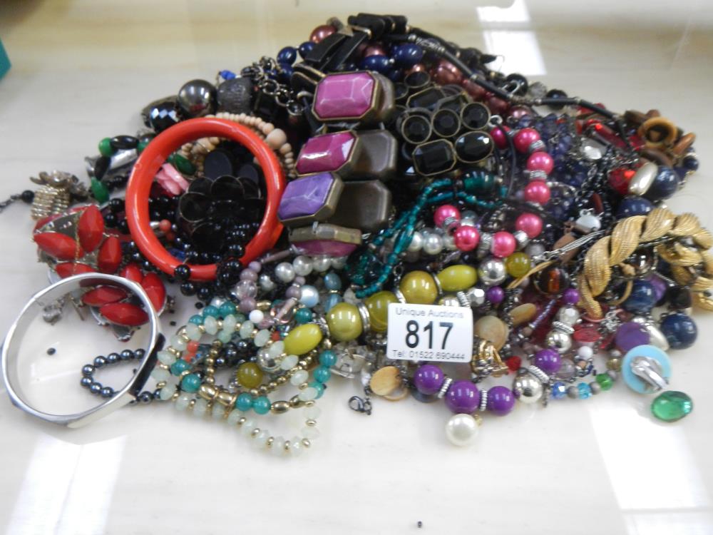 A large tray of costume jewellery.