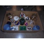 A box of miscellaneous items including tankards, paperweights etc.