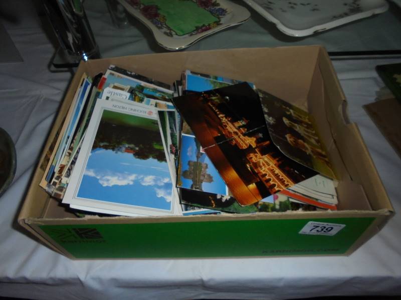 A quantity of postcards.