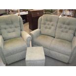 A green fabric 2 seater settee, chair and foot stool