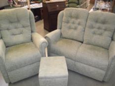 A green fabric 2 seater settee, chair and foot stool