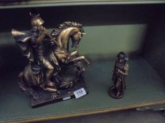 A bronzed resin figure of George and the Dragon and figure of Napoleon.