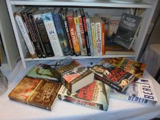 A mixed lot of war related books