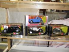 4 boxed Burago cars scale 1;24 Jaguar, Mercedes, Bugatti and Citroen