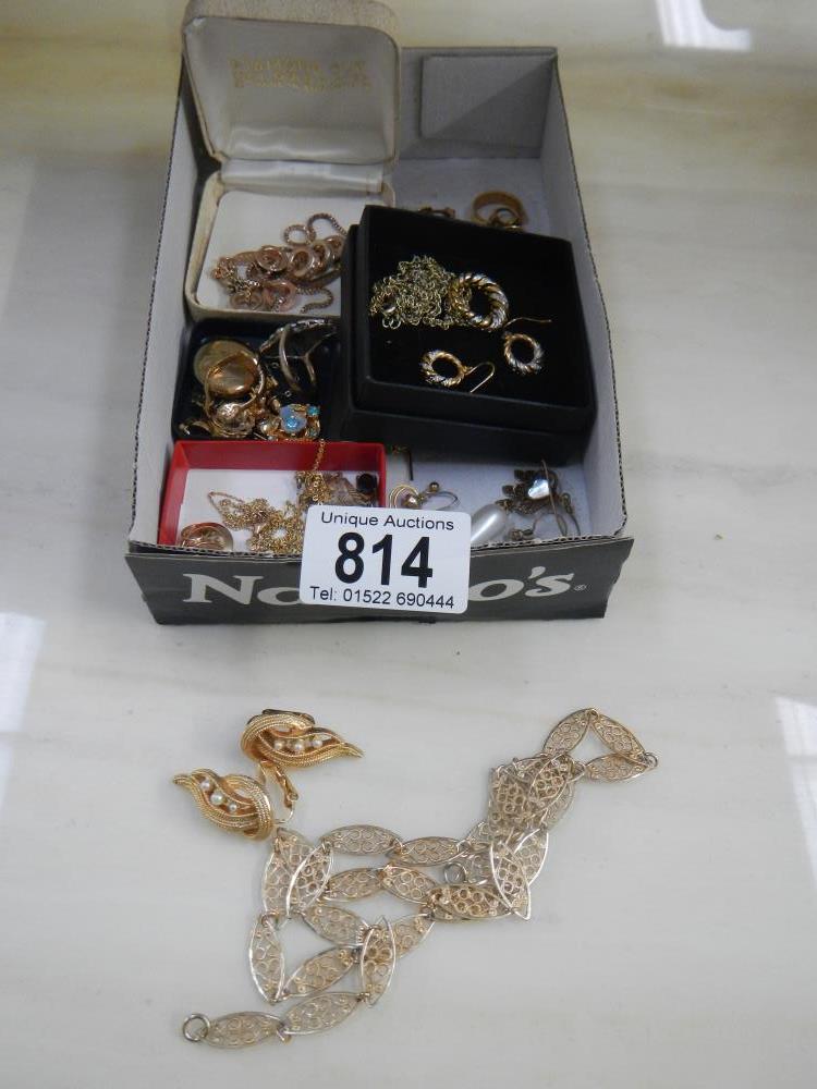 A quantity of gold coloured jewellery.