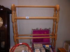 A wooden towel rail.