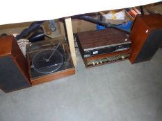 A quantity of vintage tuners/record players, speakers all by Marconi etc