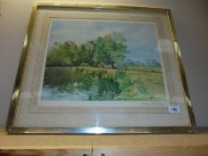 A signed print of lakeside farming scene signed Alwyn Crawshaw.