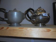 An argent pewter teapot and EPBM plated tea pot.