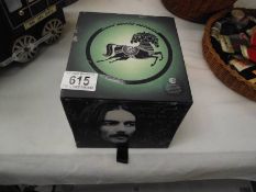 A boxed set of cd's by George Harrison, The Dark Horse Years 1976-1992 (includes 5 cd's, 2 sacd's